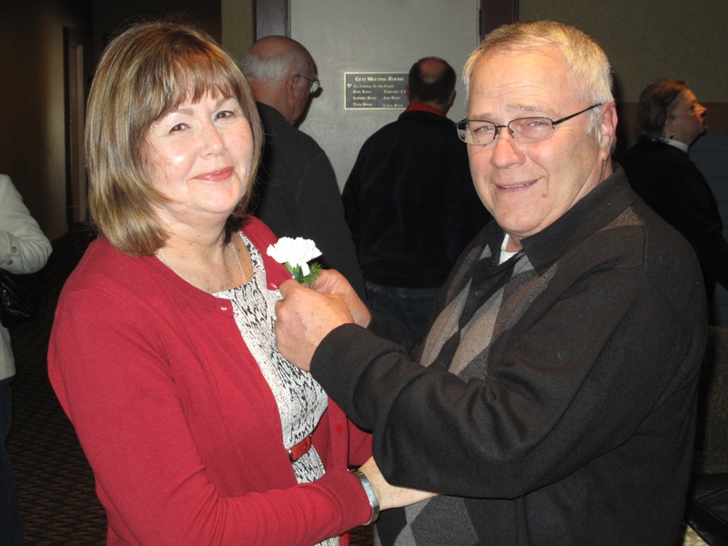 Tom Buscaglia carefully pins Judy